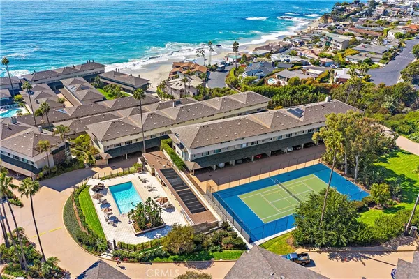 an aerial view of a pool patio patio and outdoor seating
