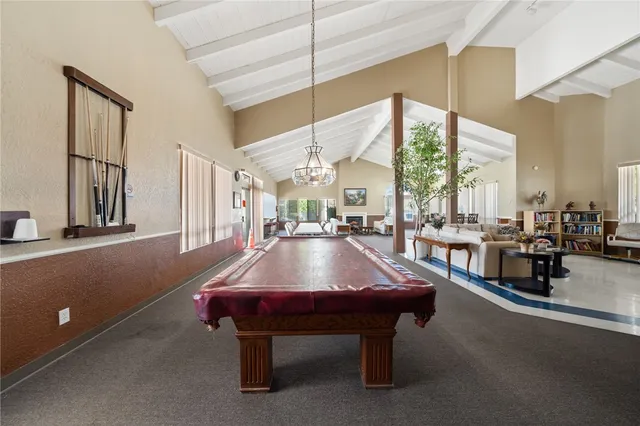 an aerial view of a house with swimming pool