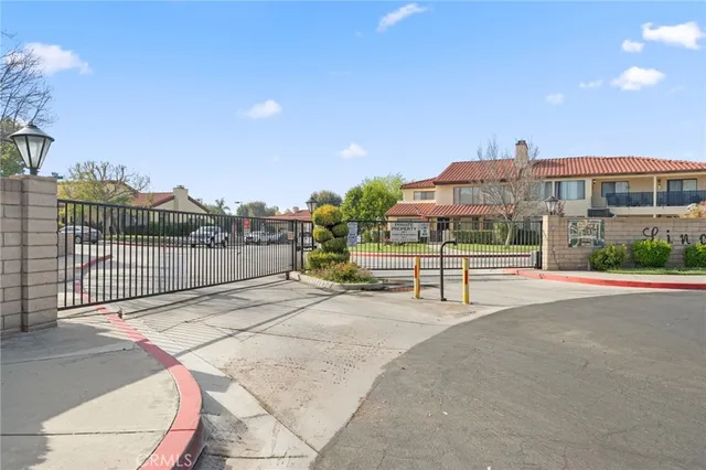 a view of a house with a street