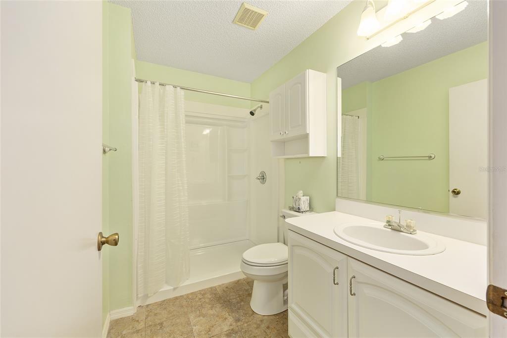 1710 Rosales Road The Villages, FL 32162 - Photo 16 of 23 a bathroom with a sink a toilet and shower