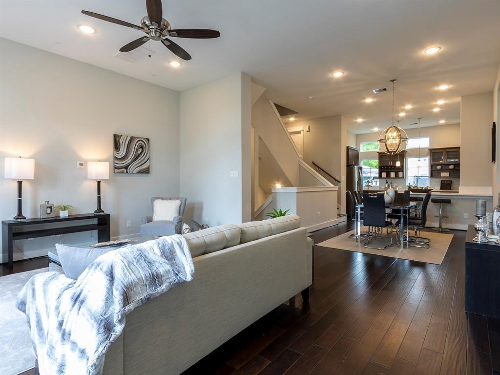 1027 West 24th Street Houston, TX 77008 - Photo 6 of 17 a living room with furniture and wooden floor