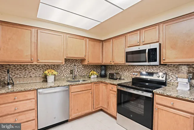 $585,000 | 7720 Tremayne Place, Unit 312, McLean, VA 22102