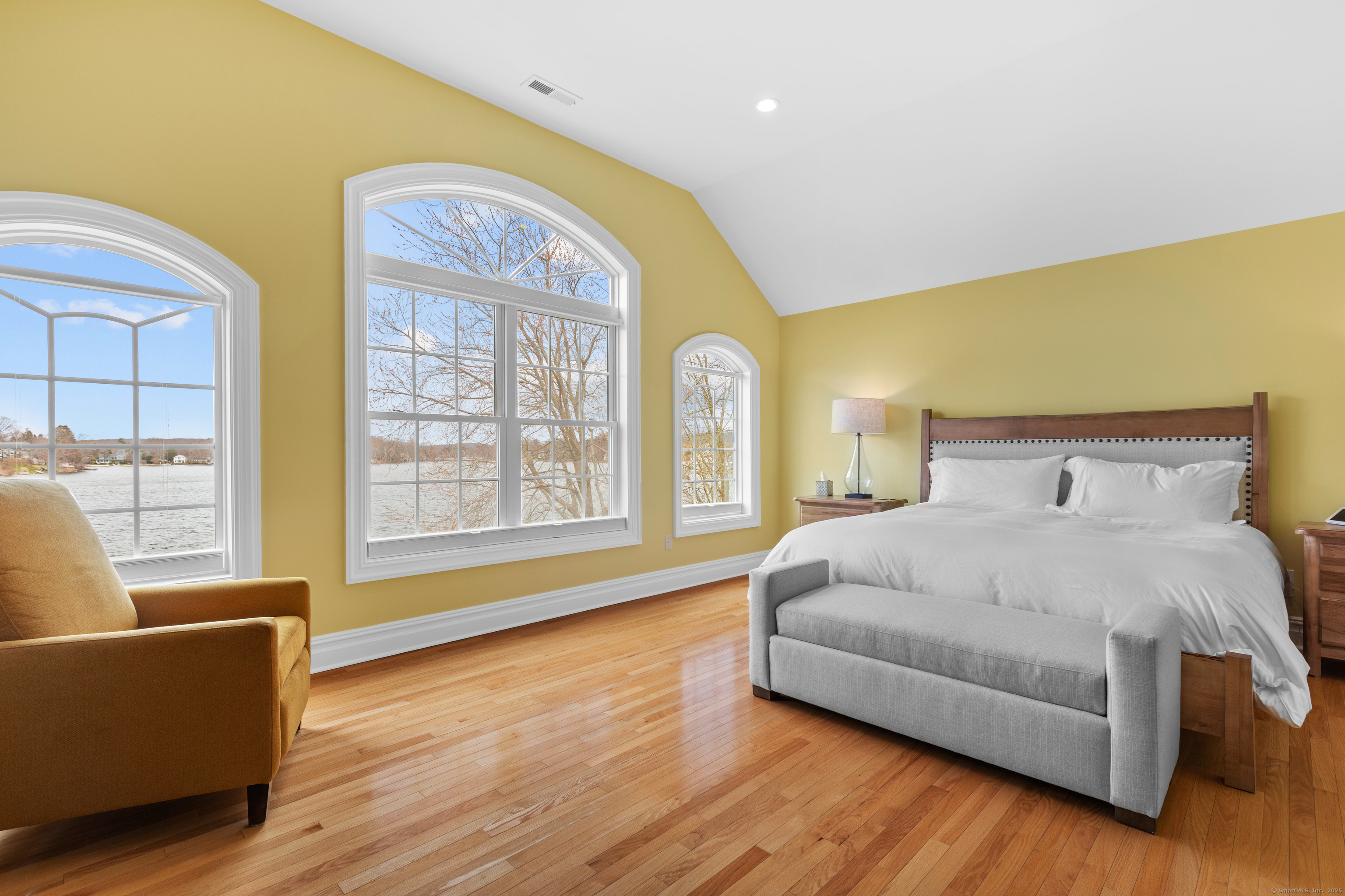1727 Meriden Road Wolcott, CT 06716 - Photo 15 of 34 a spacious bedroom with a bed and wooden floor