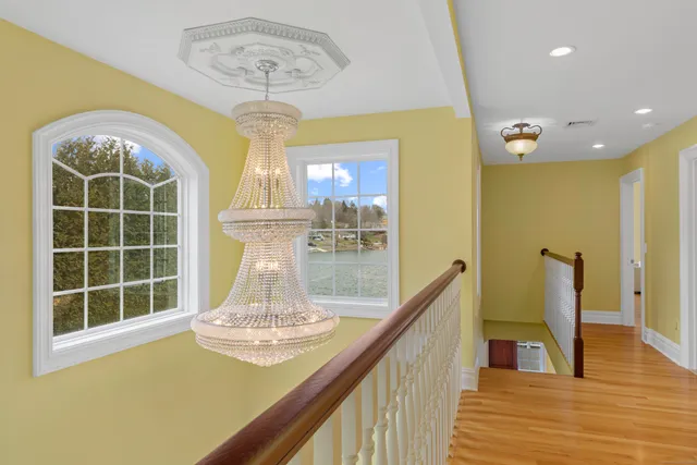 a view of a living room with a large window