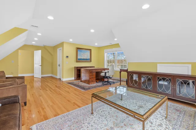 a living room with a couch and a table