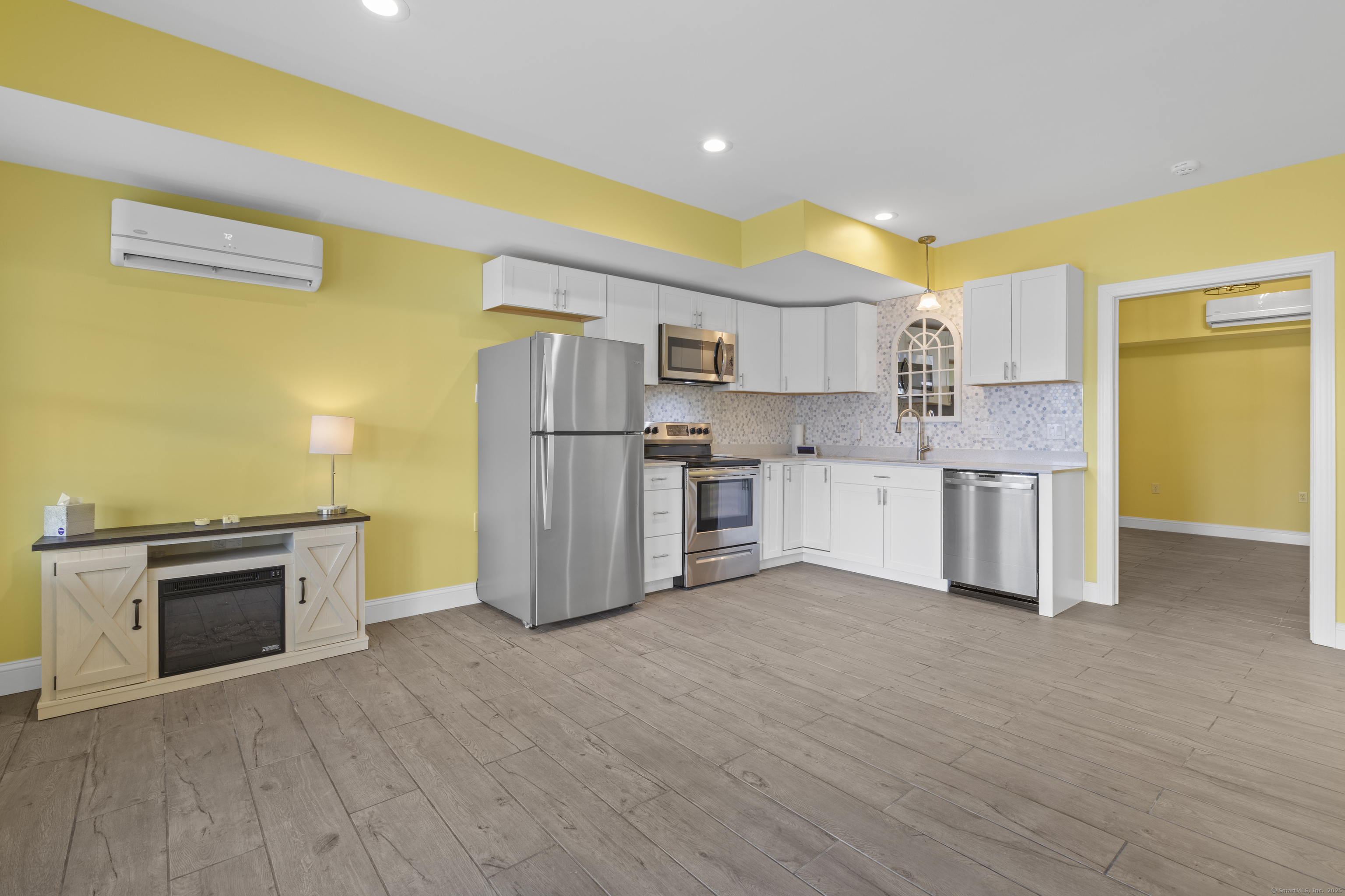 1727 Meriden Road Wolcott, CT 06716 - Photo 22 of 34 a kitchen with stainless steel appliances a stove a refrigerator and a sink