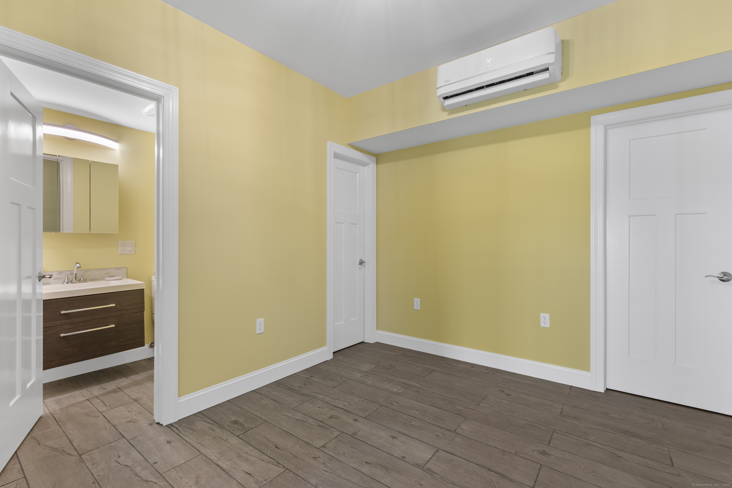 1727 Meriden Road Wolcott, CT 06716 - Photo 25 of 34 a view of a livingroom with wooden floor