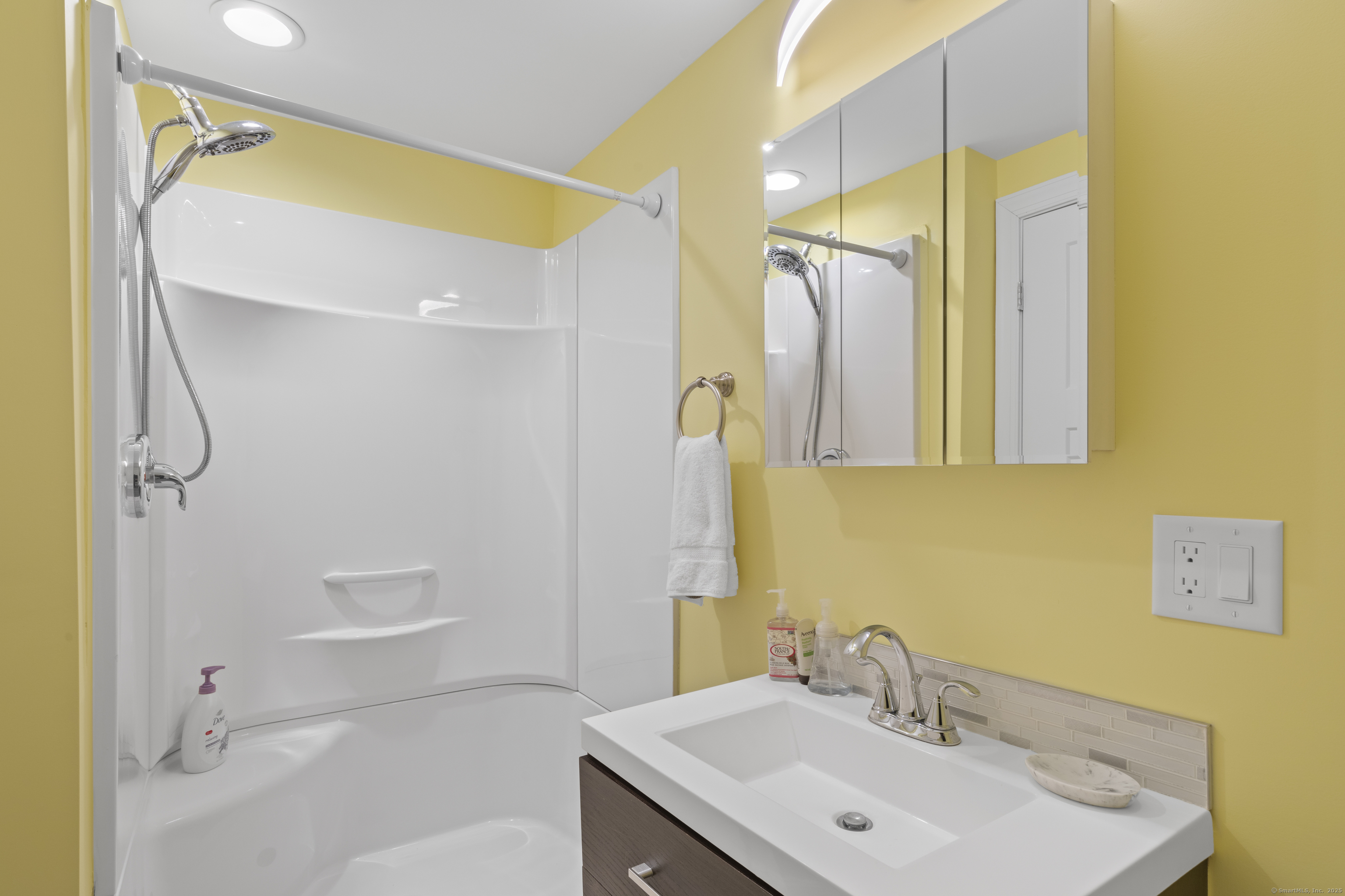 1727 Meriden Road Wolcott, CT 06716 - Photo 27 of 34 a bathroom with a sink and a mirror