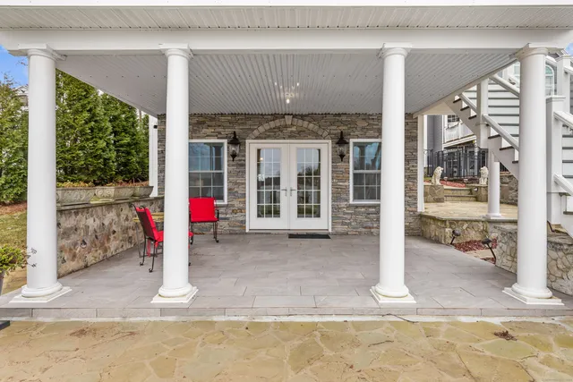 a front view of a house with a porch