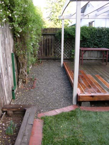2109 Little River Avenue Santa Rosa, CA 95401 - Photo 11 of 12 standing on the vegetable planter box looking back toward the deck which is just outside the diningroom