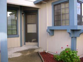 2109 Little River Avenue Santa Rosa, CA 95401 - Photo 3 of 12 Front door. One bedroom window is at the left, kitchen window is seen on the right.