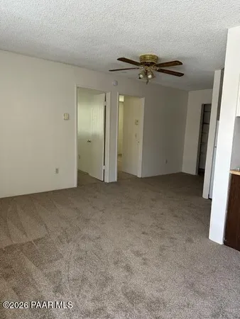 an empty room with a mirror