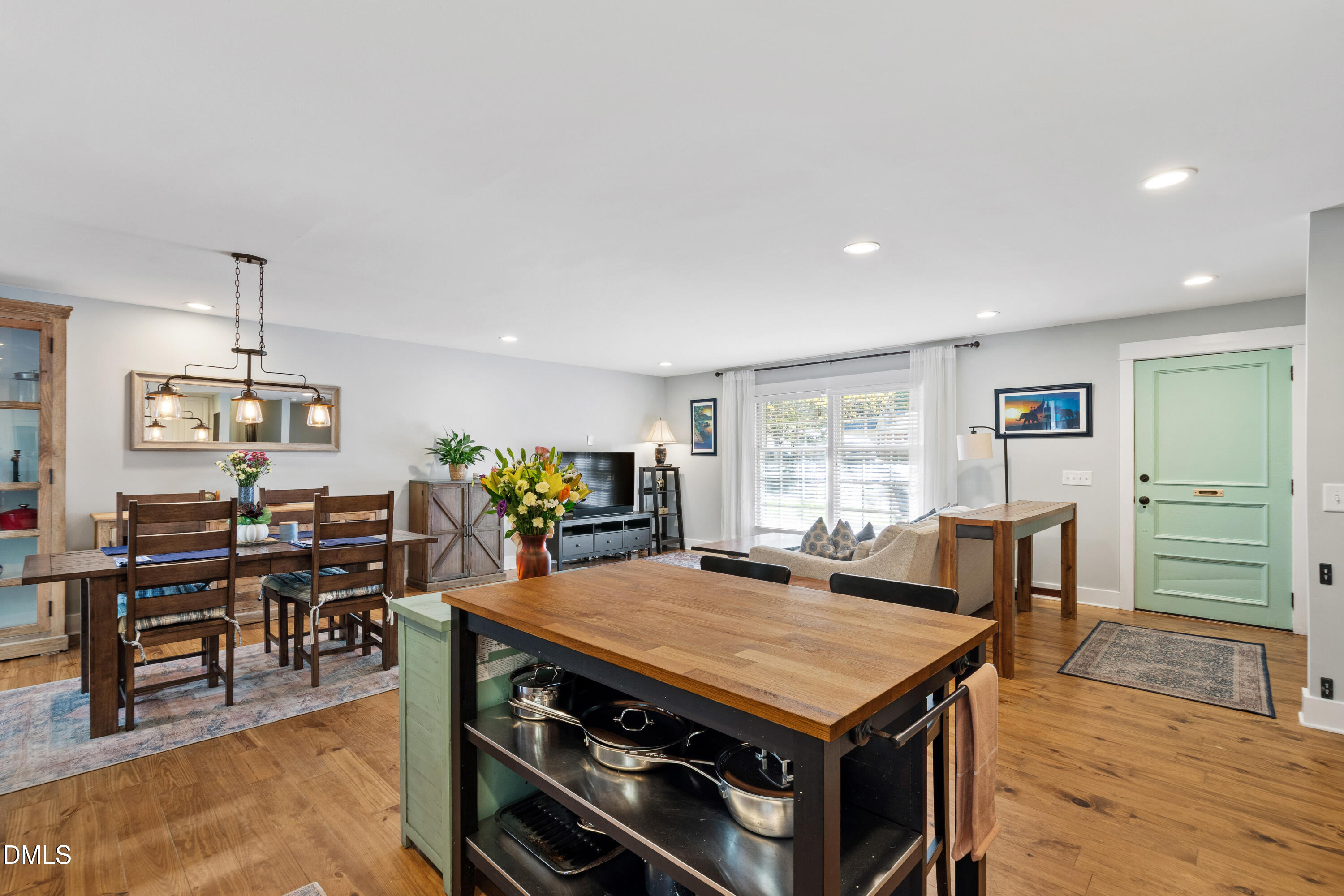 408 Troy Place Raleigh, NC 27609 - Photo 13 of 49 a view of a dining room with furniture and wooden floor
