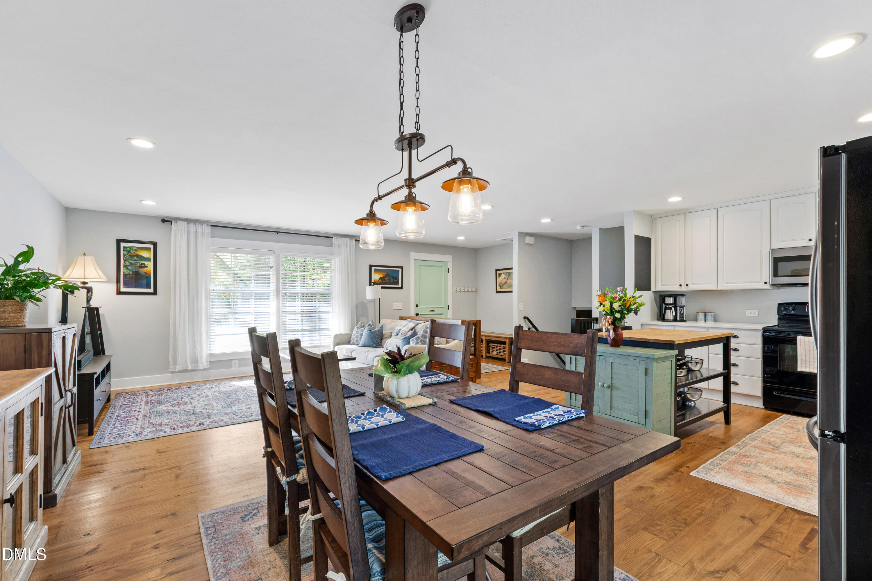 408 Troy Place Raleigh, NC 27609 - Photo 15 of 49 a view of a dining room with furniture