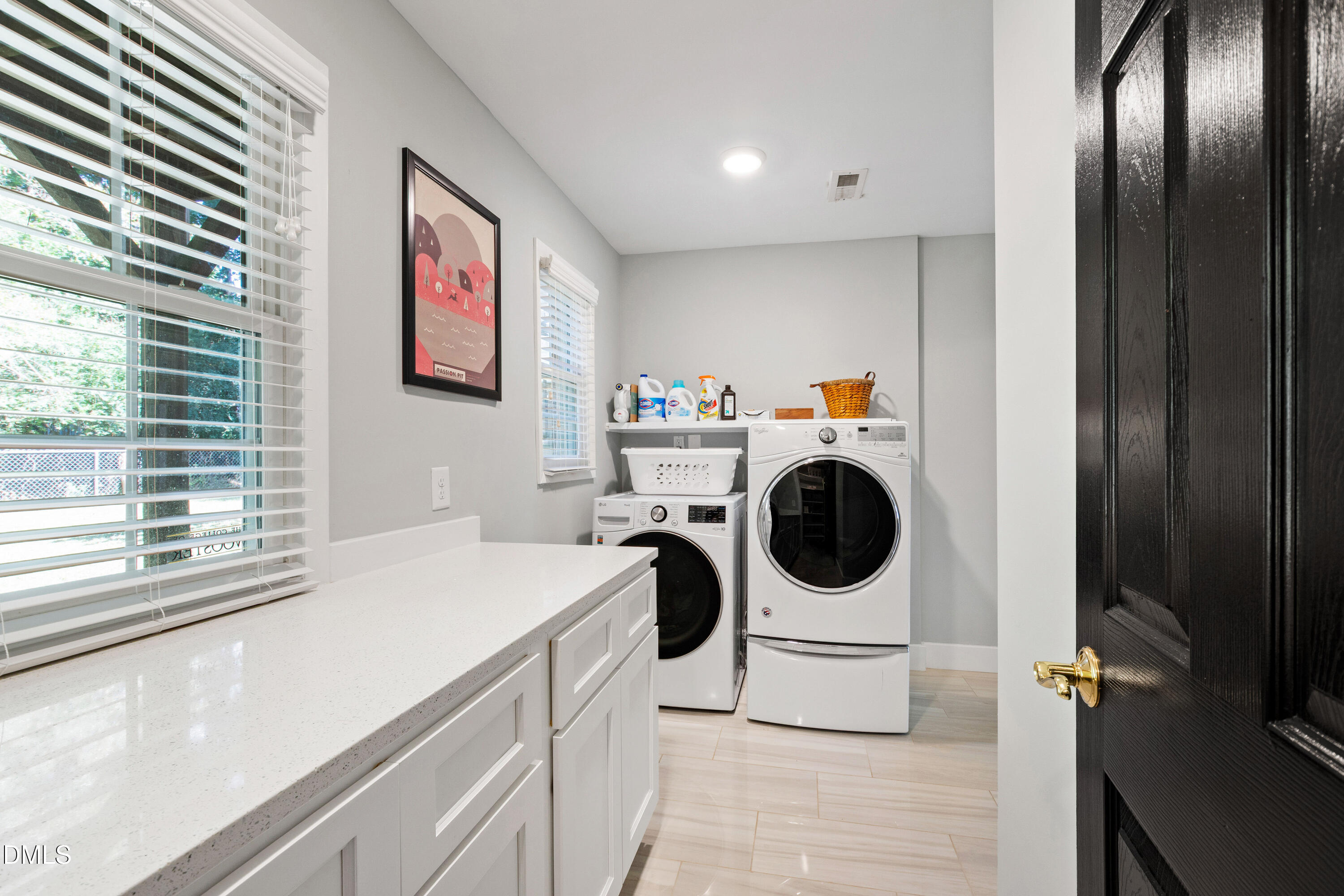 408 Troy Place Raleigh, NC 27609 - Photo 21 of 49 a utility room with dryer and washer