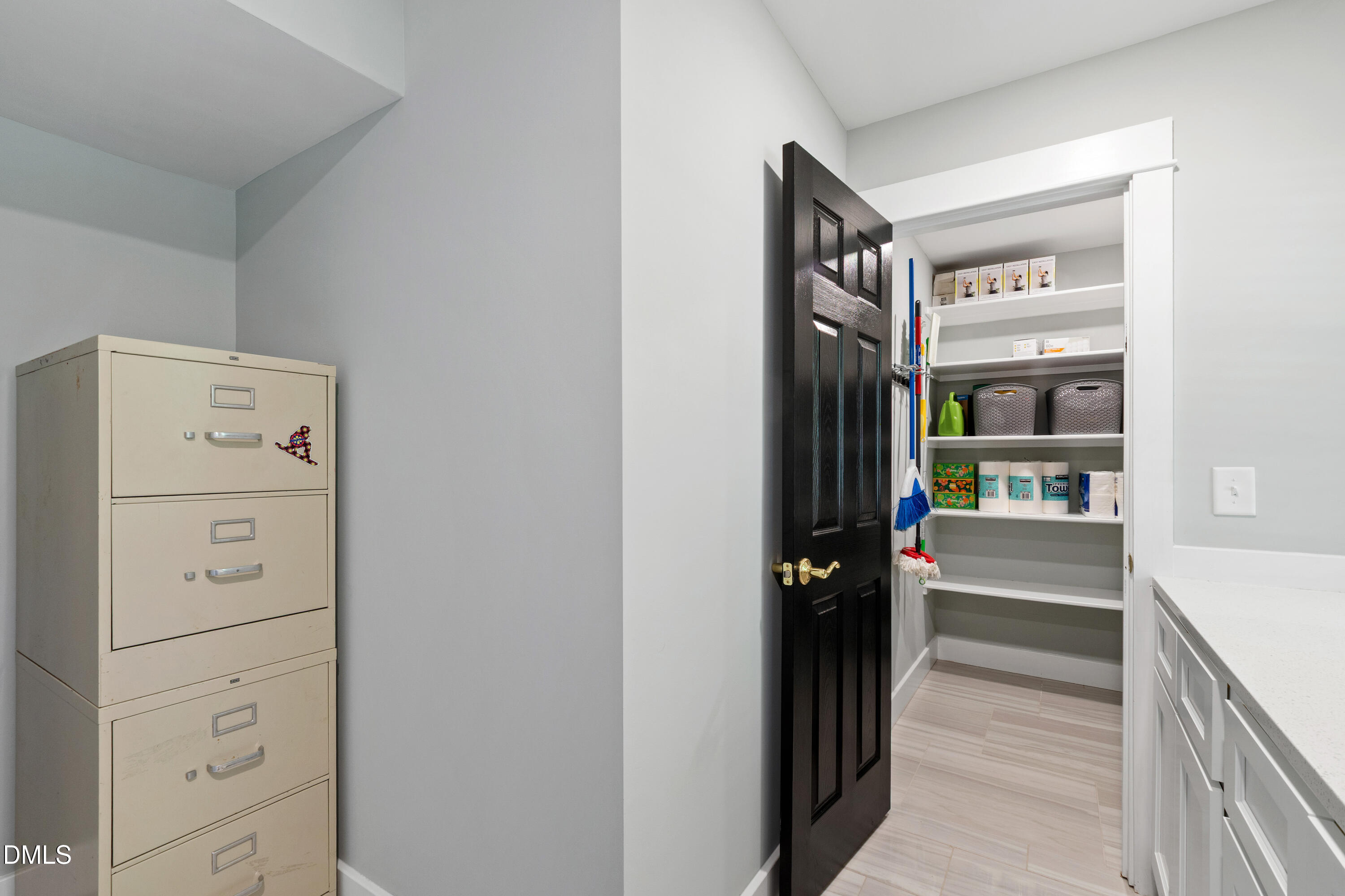 408 Troy Place Raleigh, NC 27609 - Photo 22 of 49 a view of walk in closet with clothes and shoes