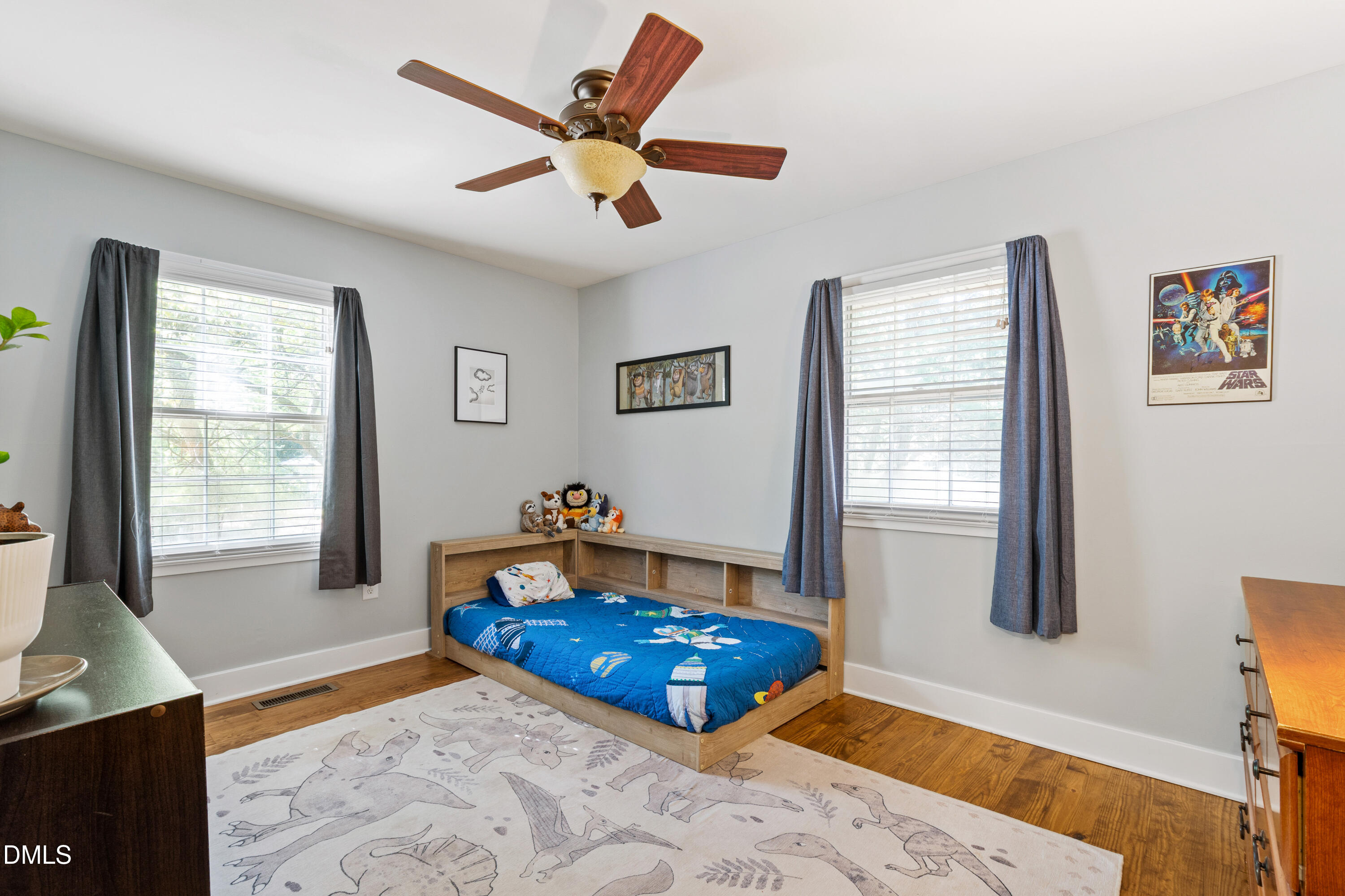 408 Troy Place Raleigh, NC 27609 - Photo 24 of 49 a bedroom with a bed and a window