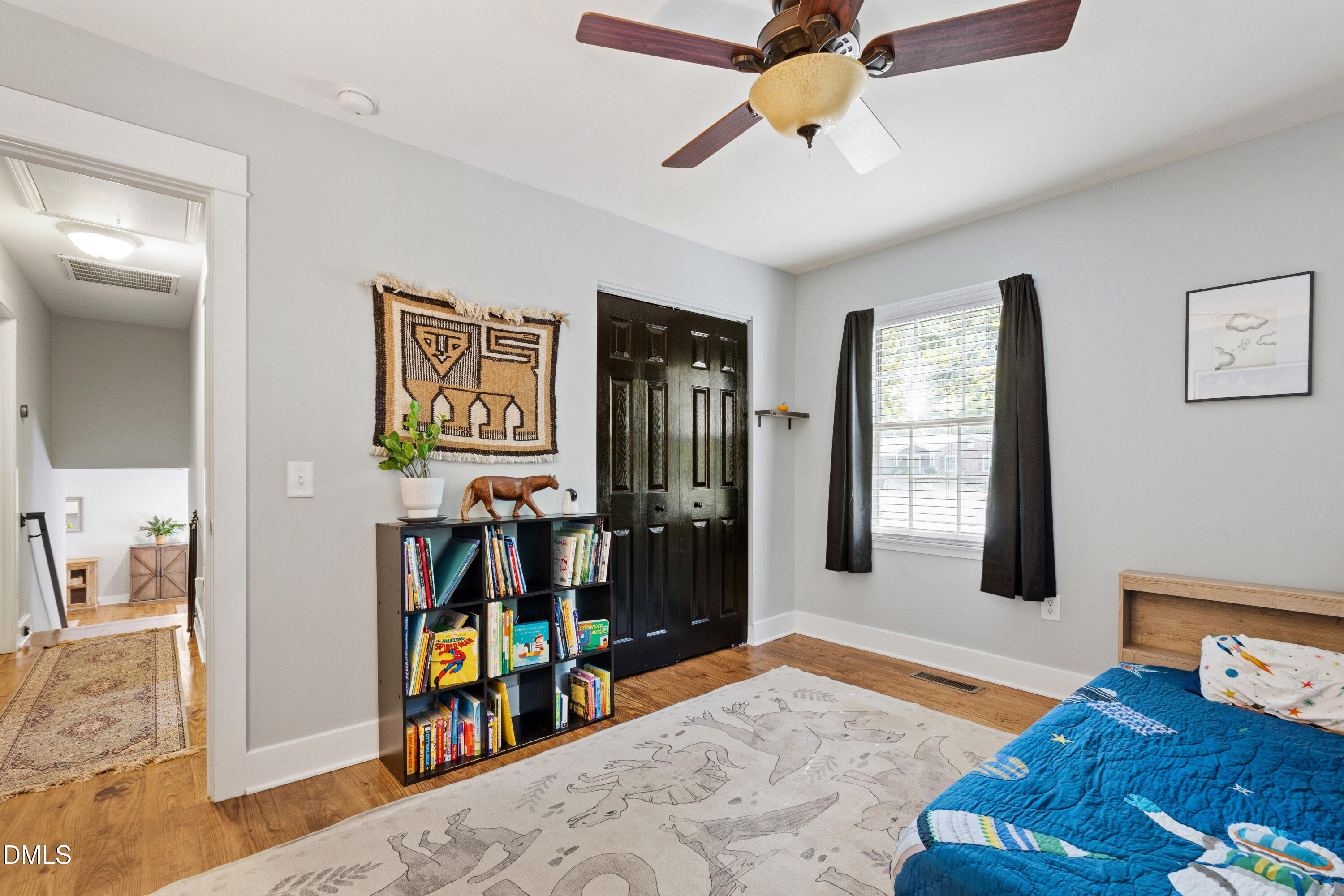 408 Troy Place Raleigh, NC 27609 - Photo 26 of 49 a bedroom with furniture and window