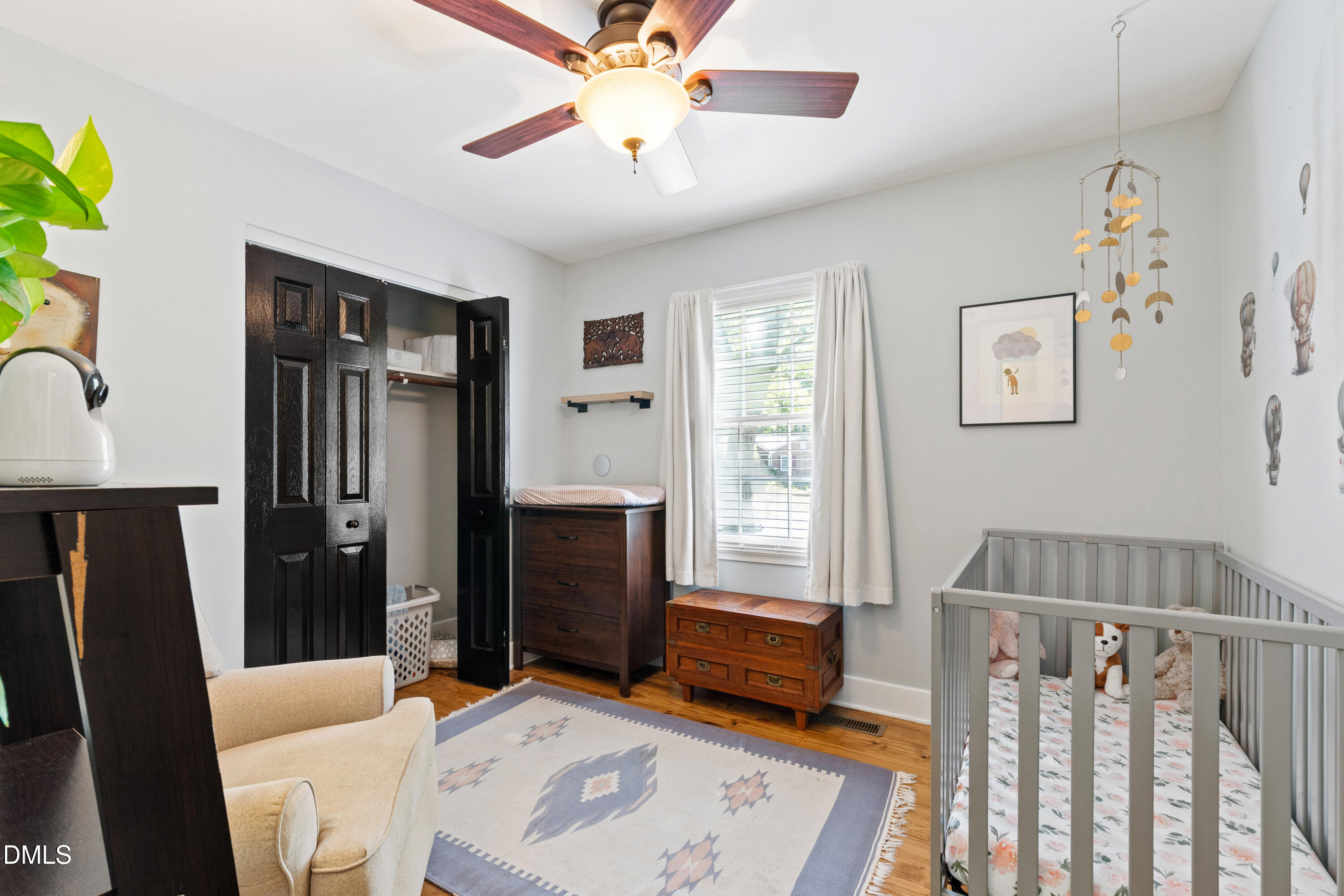 408 Troy Place Raleigh, NC 27609 - Photo 31 of 49 a living room with furniture and a window