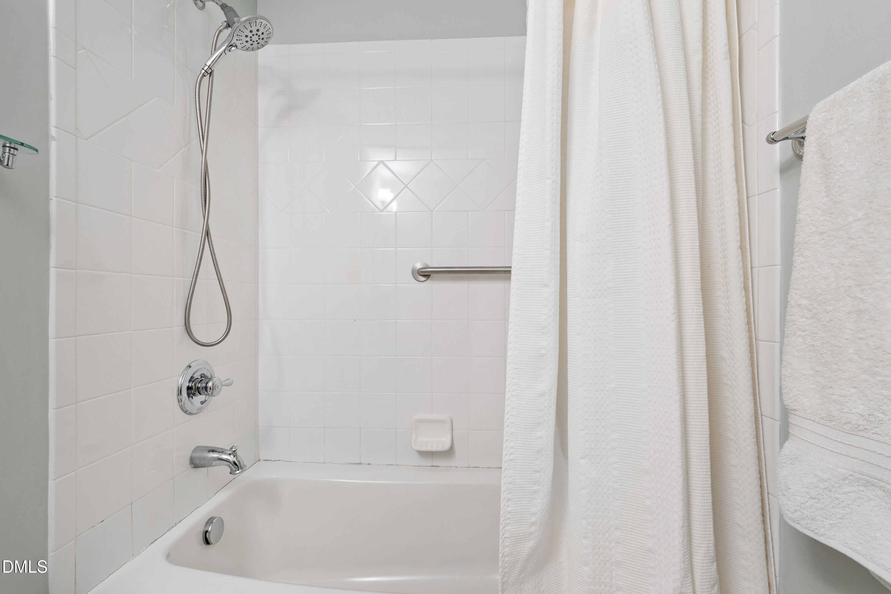 408 Troy Place Raleigh, NC 27609 - Photo 34 of 49 a bathroom with a bath tub and shower