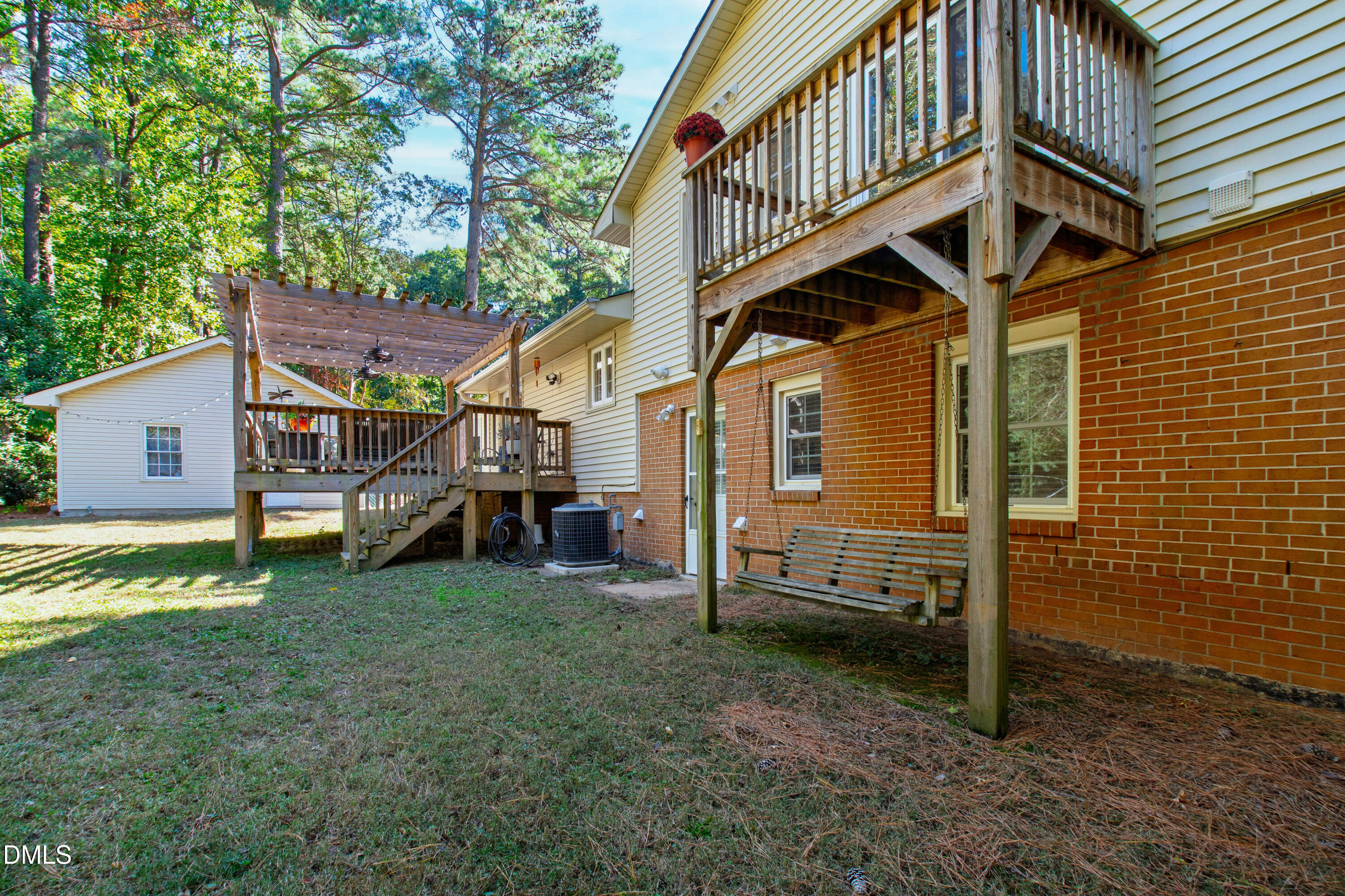 408 Troy Place Raleigh, NC 27609 - Photo 38 of 49 a view of a house with a yard