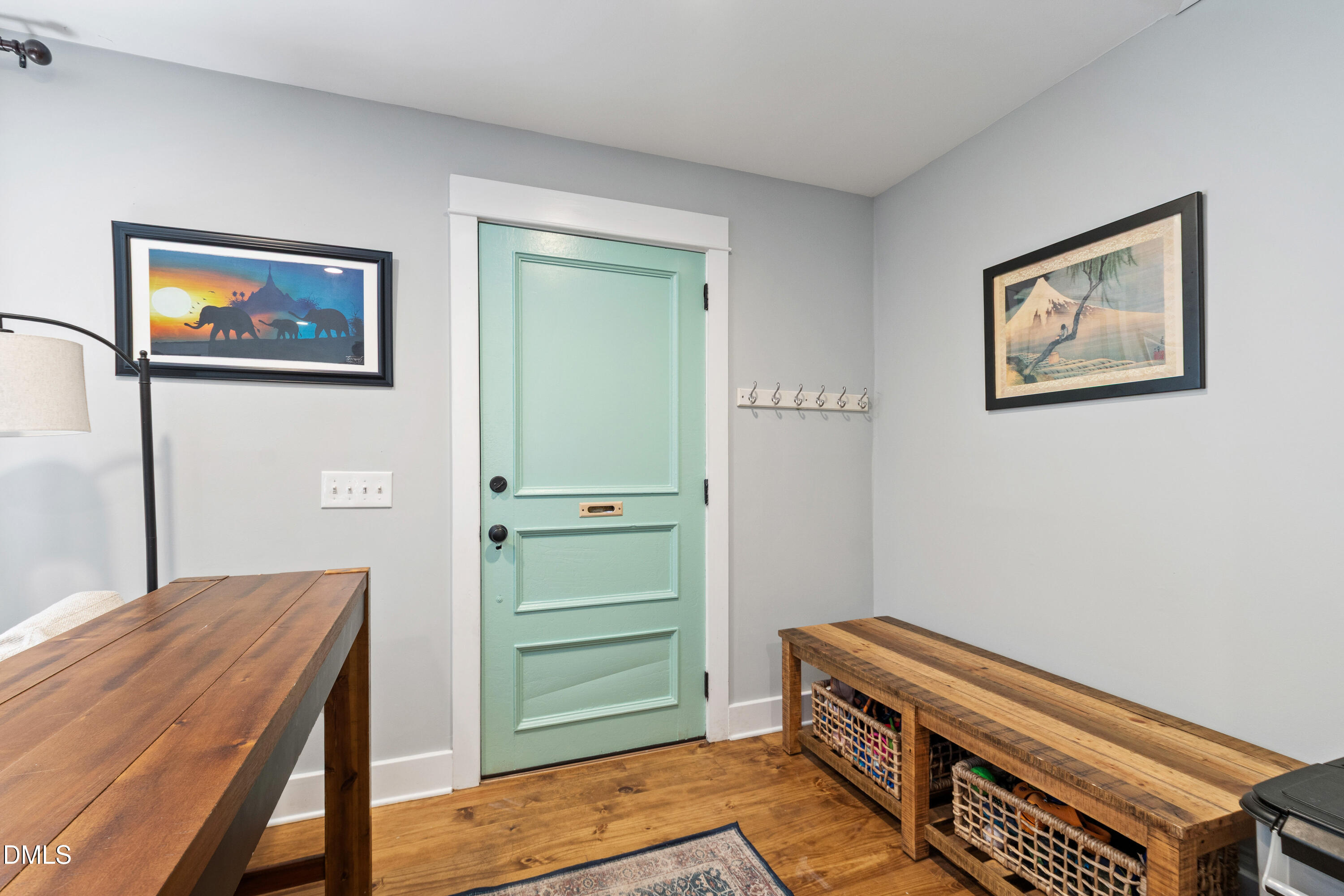 408 Troy Place Raleigh, NC 27609 - Photo 4 of 49 a room with a piano and a desk