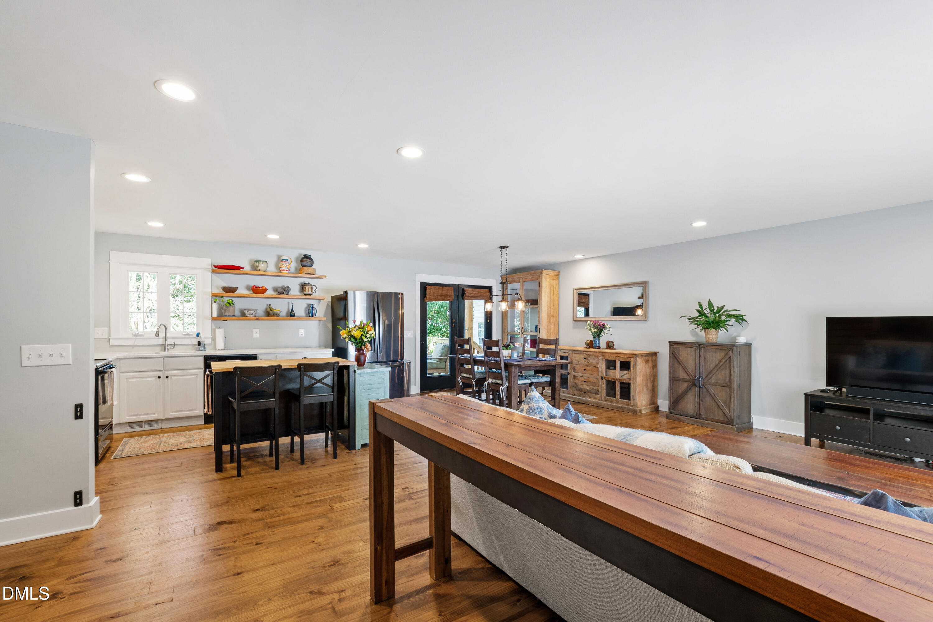 408 Troy Place Raleigh, NC 27609 - Photo 7 of 49 a view of a dining room with furniture and wooden floor