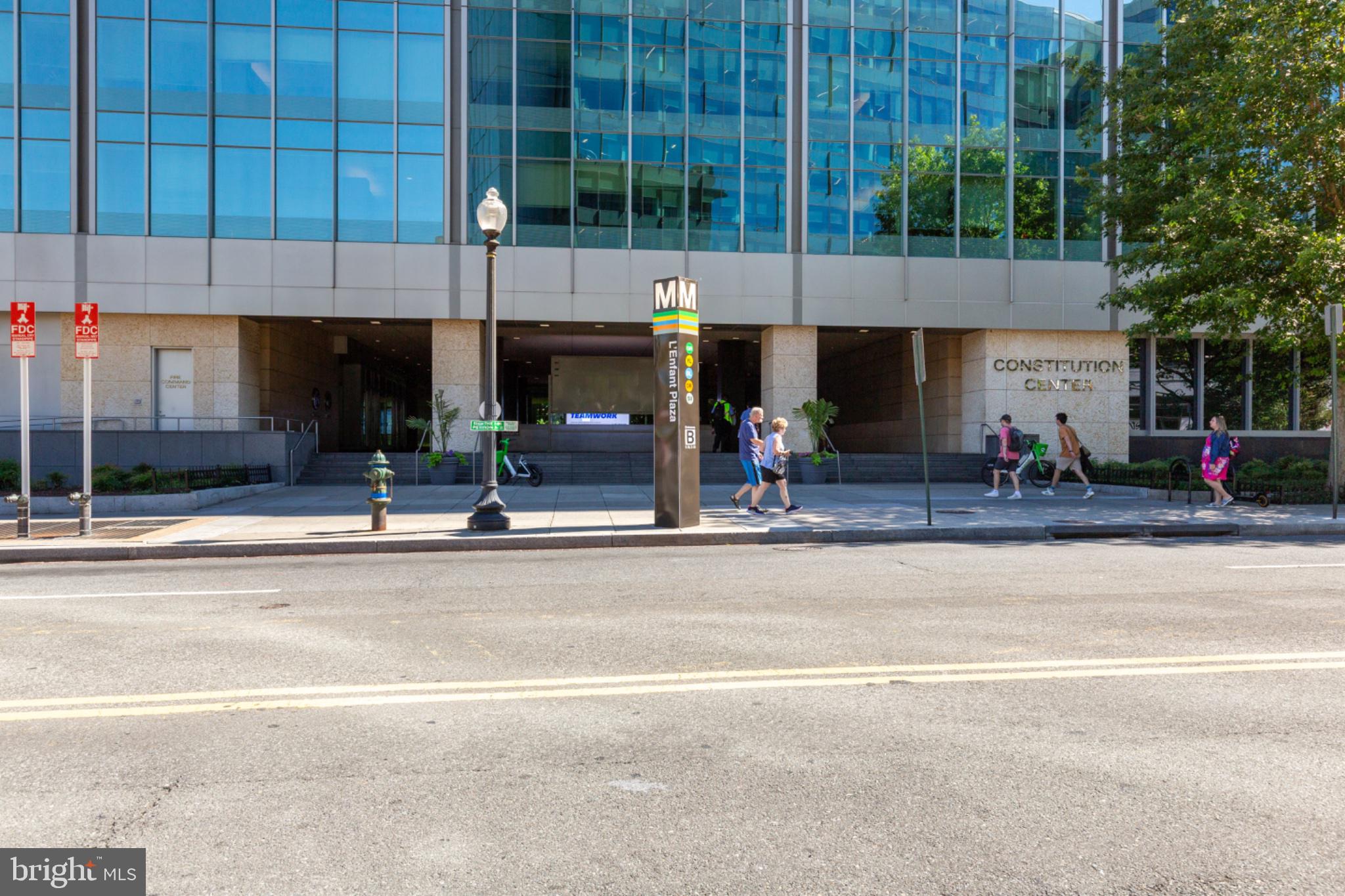 350 G Street Southwest, Unit N423 Washington, DC 20024 - Photo 42 of 43 Urban bustle near modern architecture.