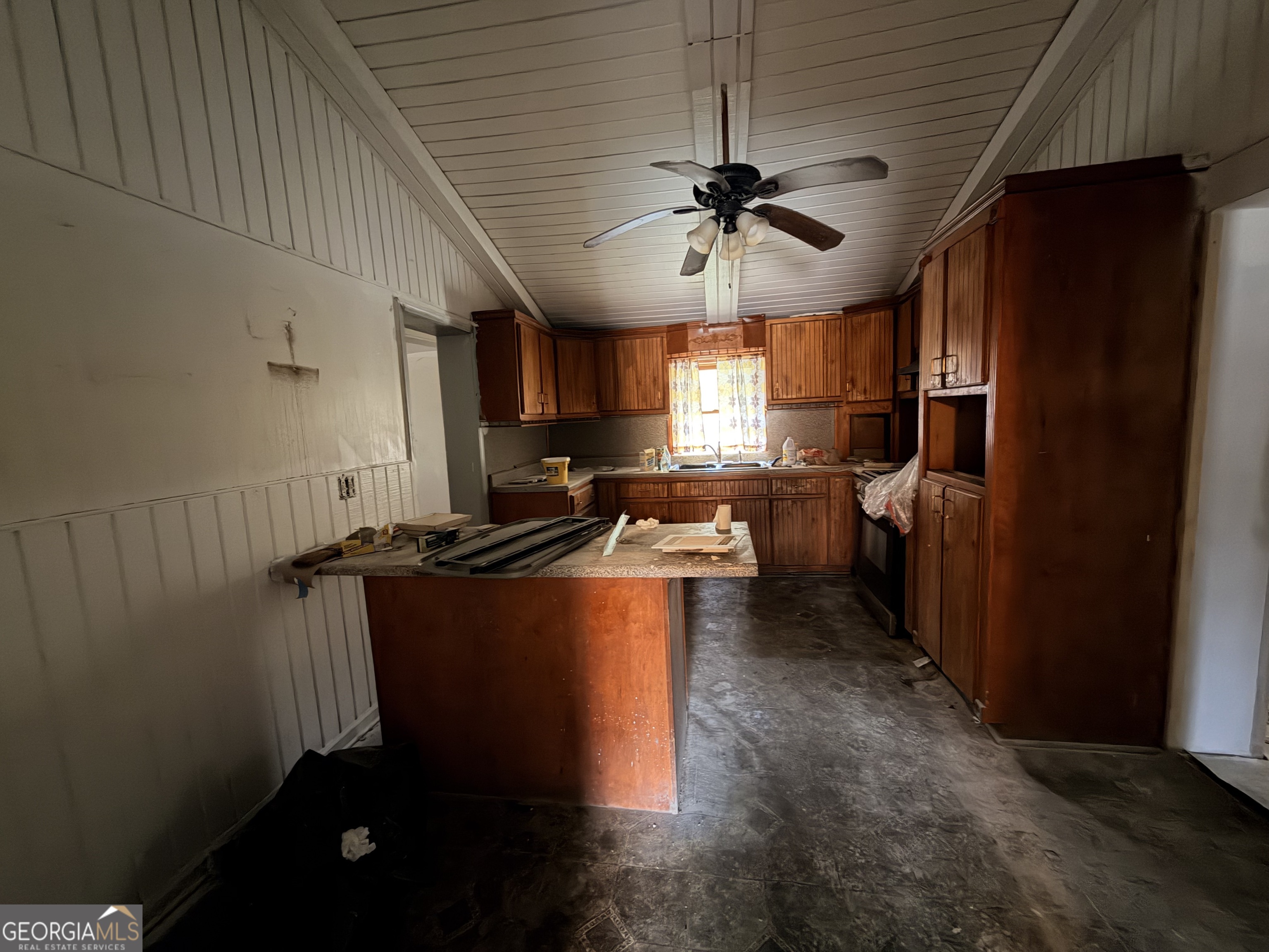 1966 Lake Rockaway Road Northwest Conyers, GA 30012 - Photo 11 of 24 a kitchen with stainless steel appliances granite countertop a refrigerator a sink dishwasher a stove and a refrigerator with wooden floor