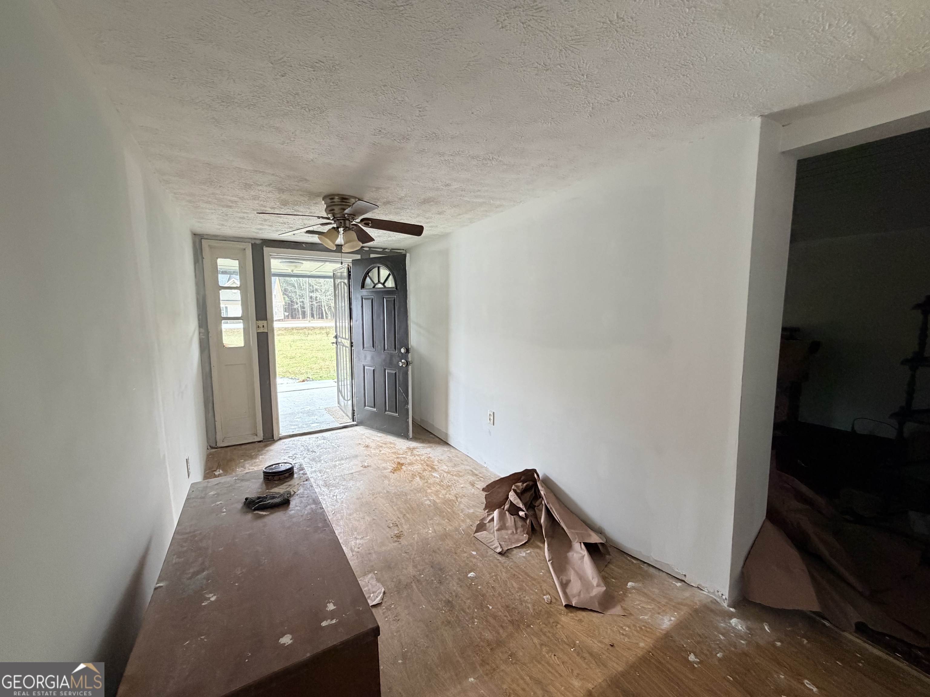 1966 Lake Rockaway Road Northwest Conyers, GA 30012 - Photo 20 of 24 a view of a livingroom with a window