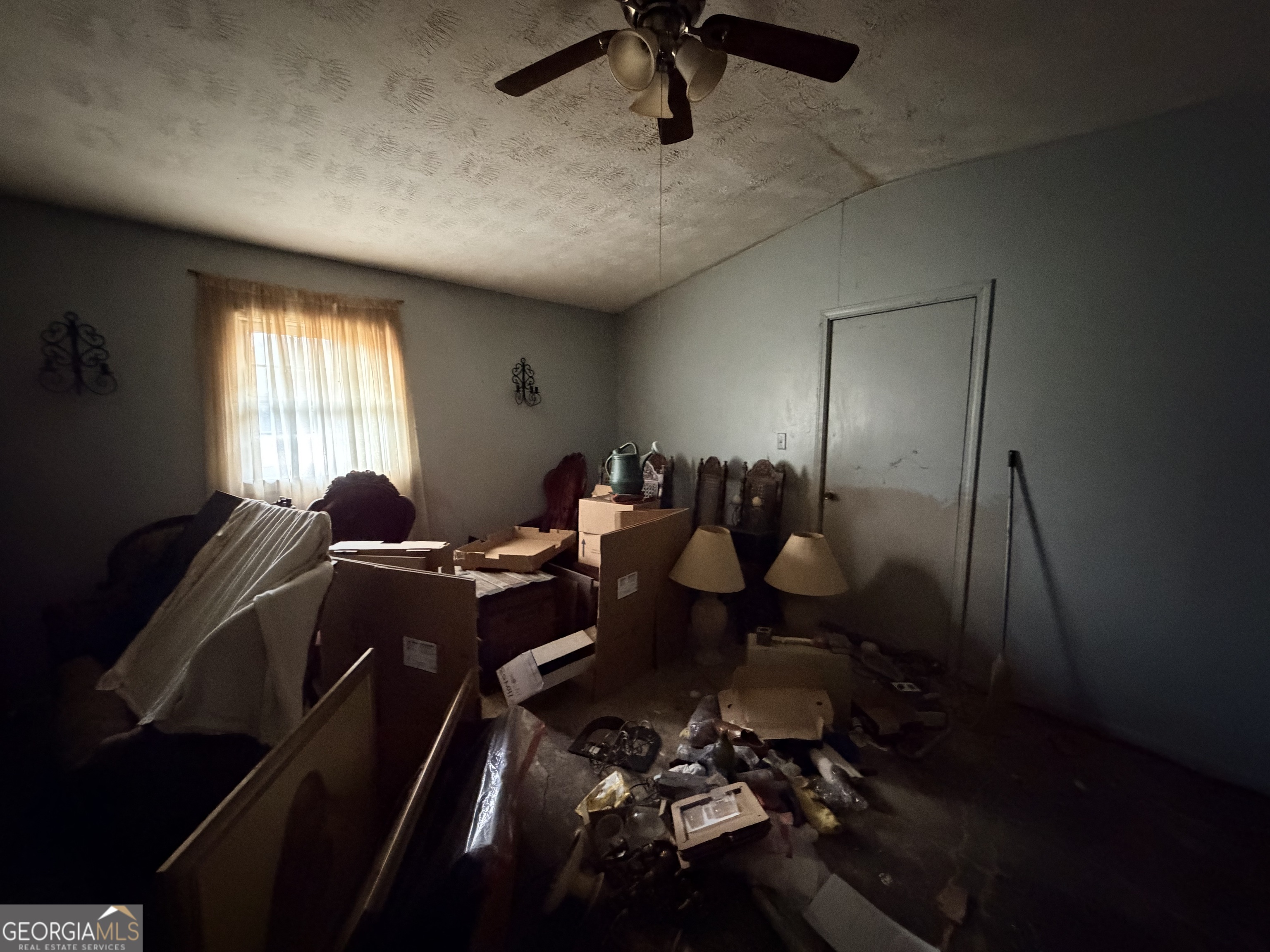 1966 Lake Rockaway Road Northwest Conyers, GA 30012 - Photo 9 of 24 a media room with lots of chairs and a projector screen