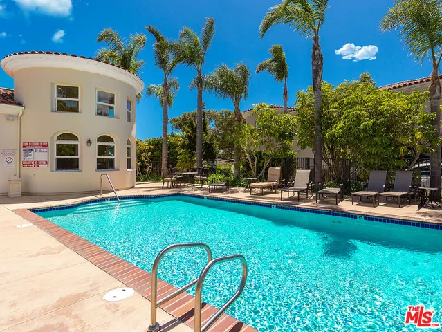 an aerial view of a house with a garden