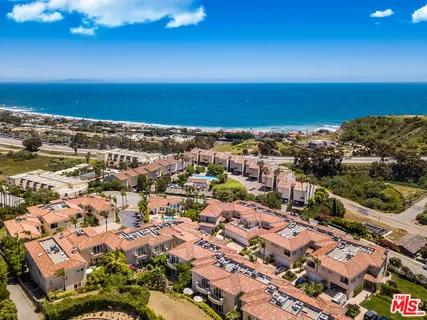 a view of balcony and workspace