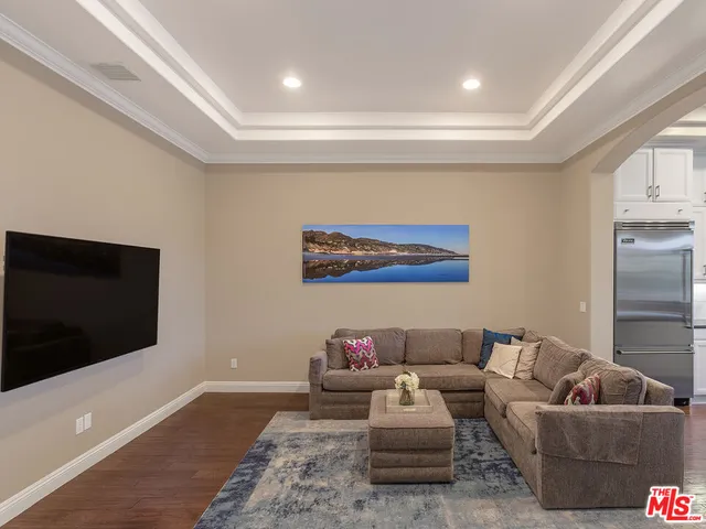 a bathroom with a sink a mirror and a window