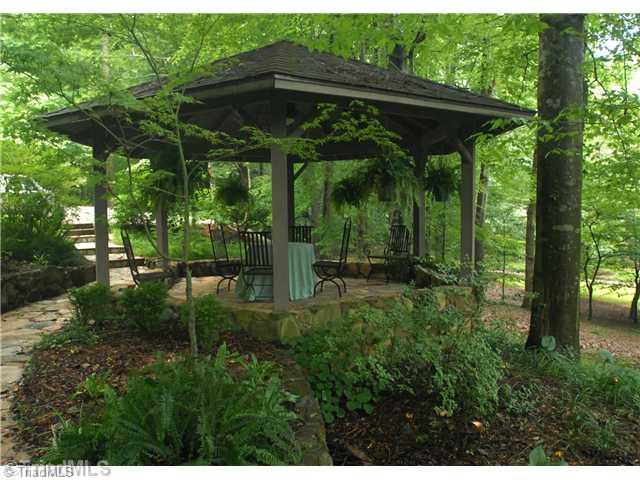 8262 Ballard Road Colfax, NC 27235 - Photo 2 of 16 Entry. Gazebo between circular drive and entry to home