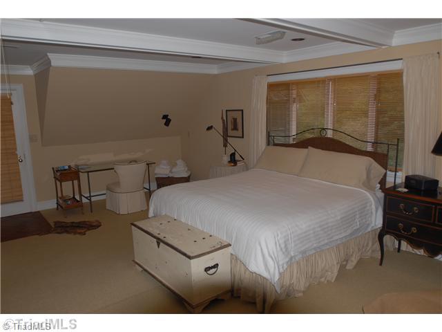 8262 Ballard Road Colfax, NC 27235 - Photo 11 of 16 In-Law Suite. Located over the detached 2 car garage, the suite features a bath kitchenette and small living room area.