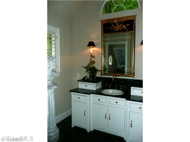 8262 Ballard Road Colfax, NC 27235 - Photo 8 of 16 Master Bath/Spa. With shower and tub master bath features Marble counters and tile floor