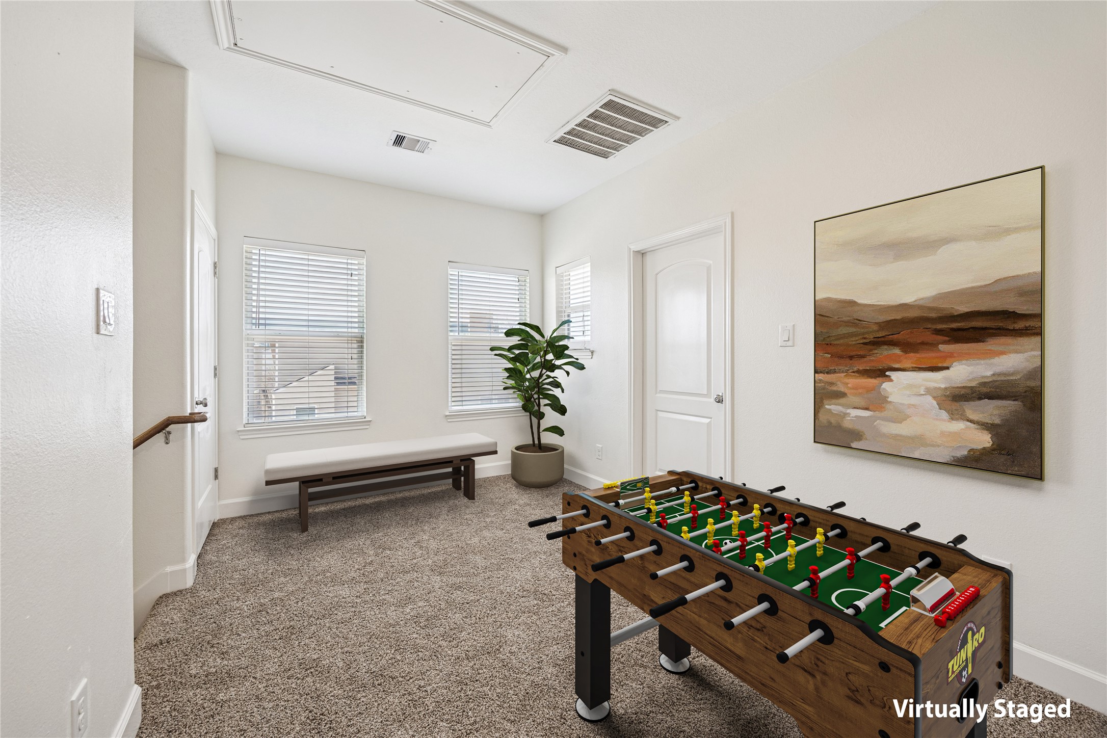 5402 Jonathan Lane Houston, TX 77011 - Photo 12 of 33 The landing on the Third Floor is perfect for a Game Room.