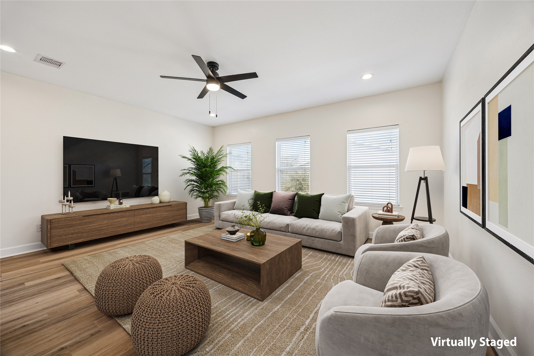 5402 Jonathan Lane Houston, TX 77011 - Photo 5 of 33 a living room with furniture and a flat screen tv