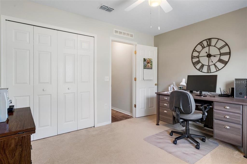 12255 Linden Drive Spring Hill, FL 34608 - Photo 19 of 26 a view of a workspace with furniture and a window