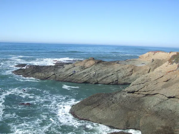 a street sign on a side of a road