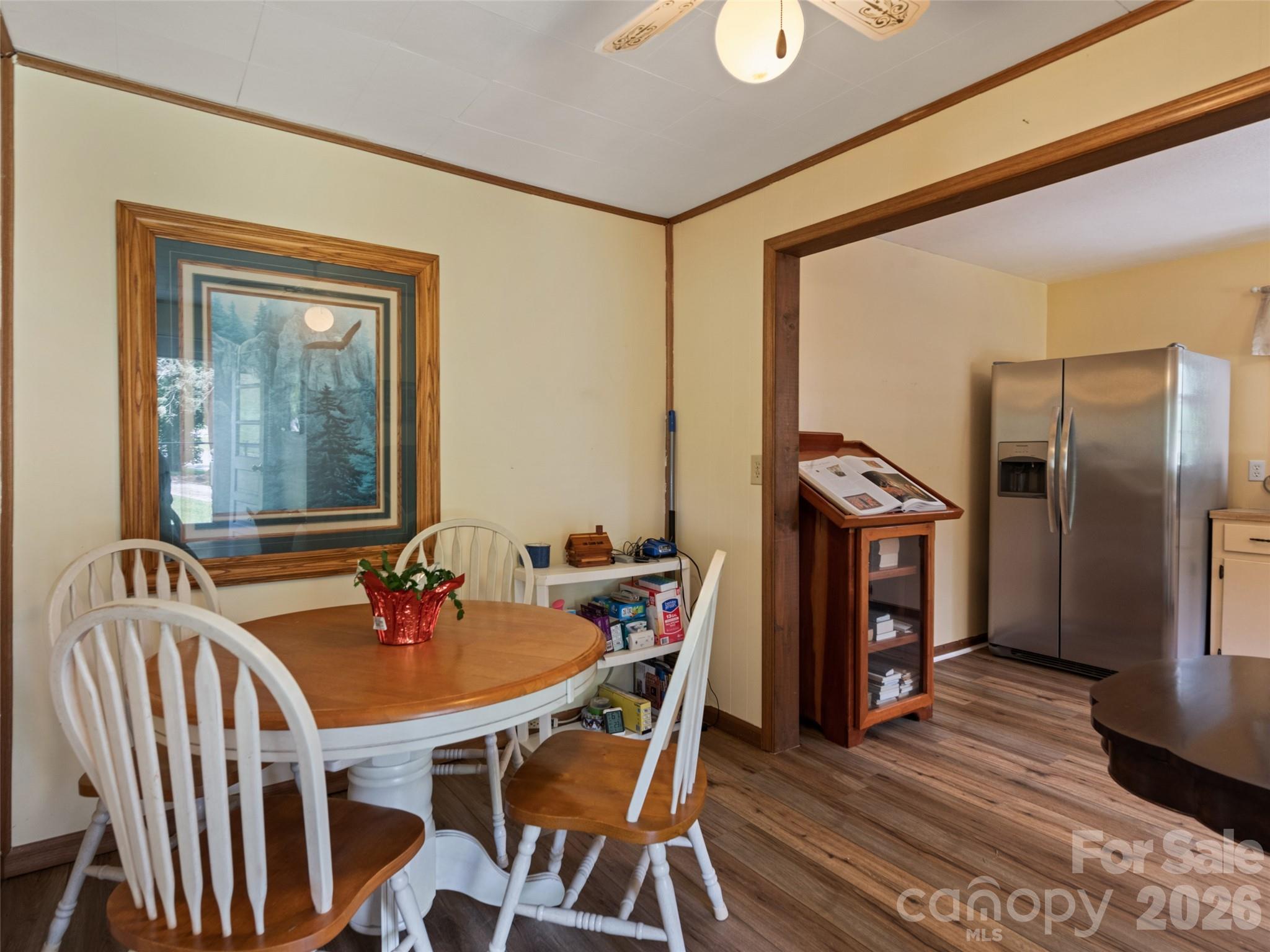 1714 Iron Duff Road Waynesville, NC 28785 - Photo 14 of 25 a dining room with furniture and wooden floor