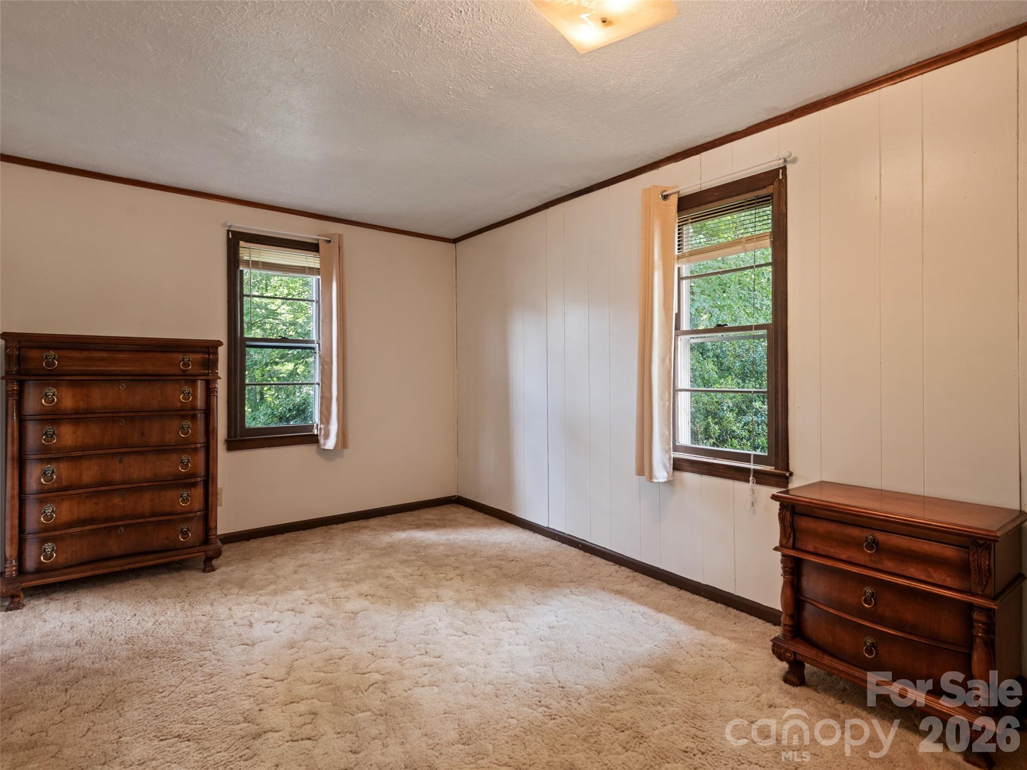 1714 Iron Duff Road Waynesville, NC 28785 - Photo 22 of 25 wooden floor and windows in a room