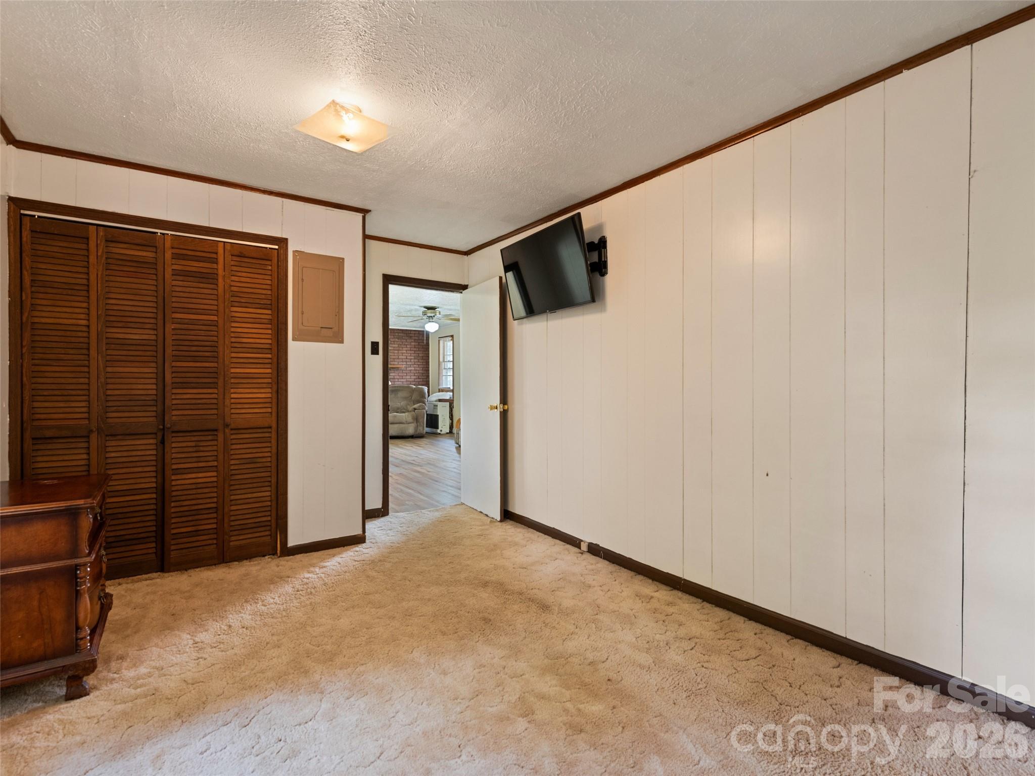 1714 Iron Duff Road Waynesville, NC 28785 - Photo 23 of 25 a view of empty room with a ceiling fan