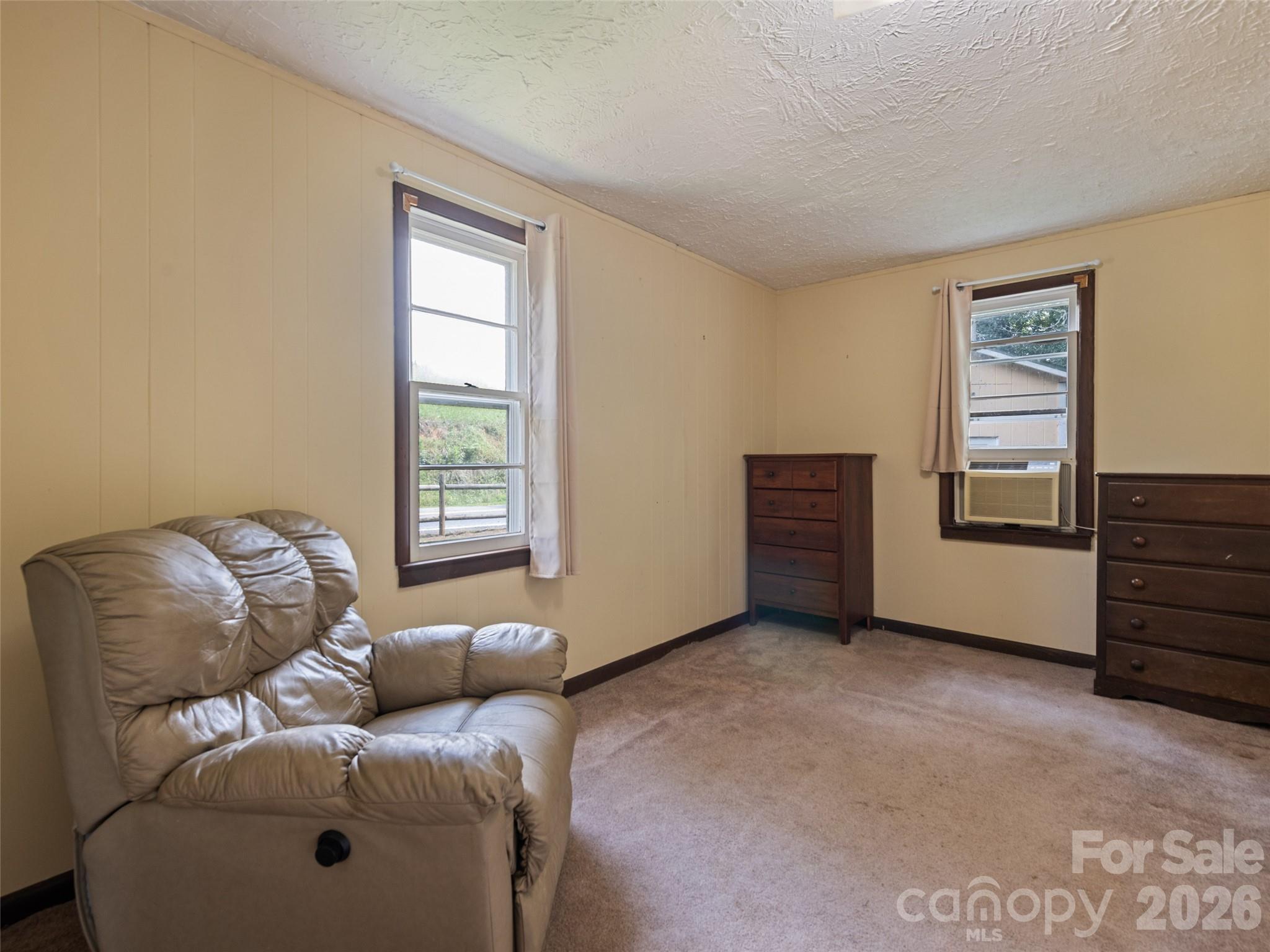 1714 Iron Duff Road Waynesville, NC 28785 - Photo 24 of 25 a living room with furniture and a window