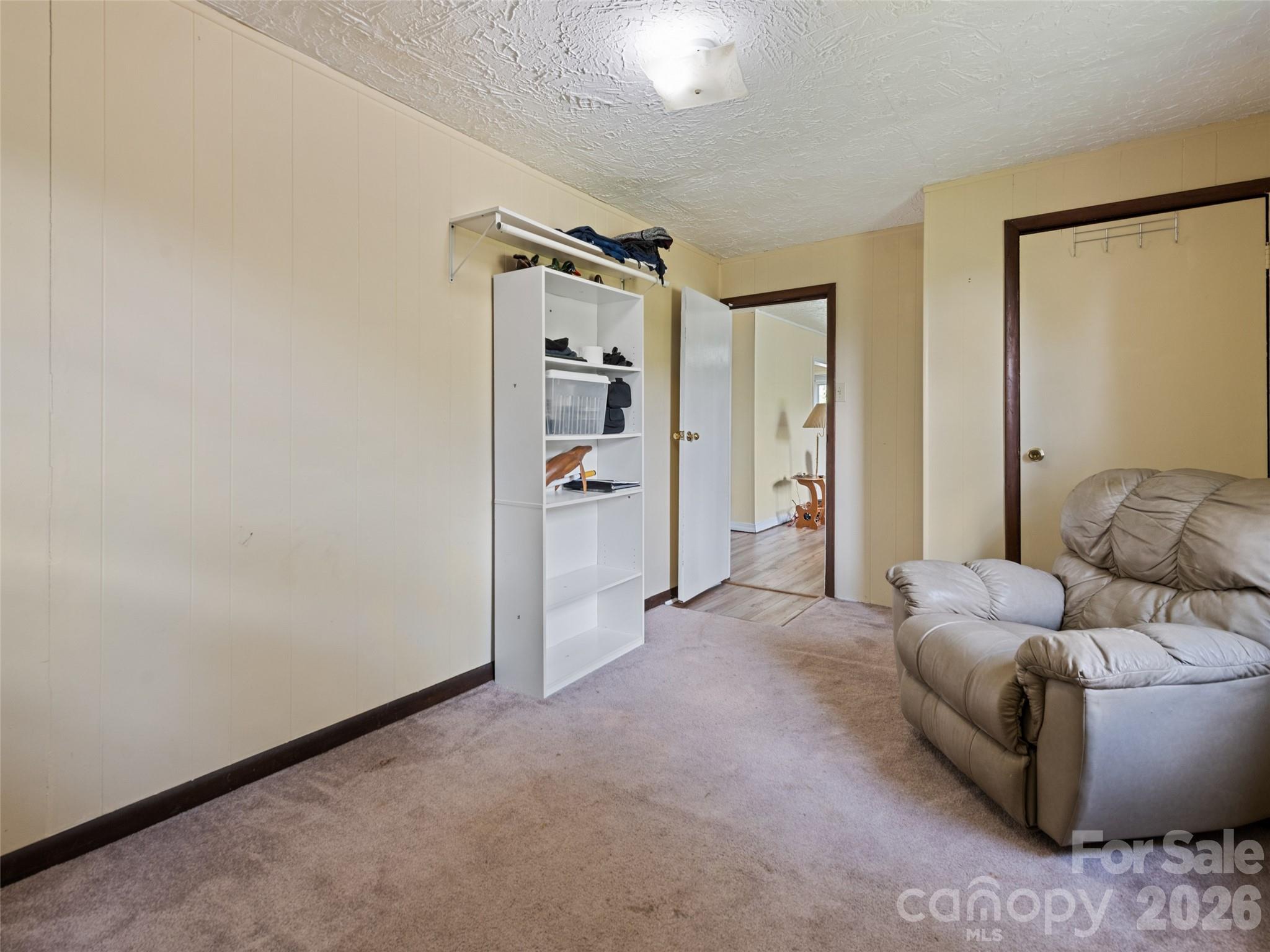1714 Iron Duff Road Waynesville, NC 28785 - Photo 25 of 25 a view of livingroom with furniture and closet