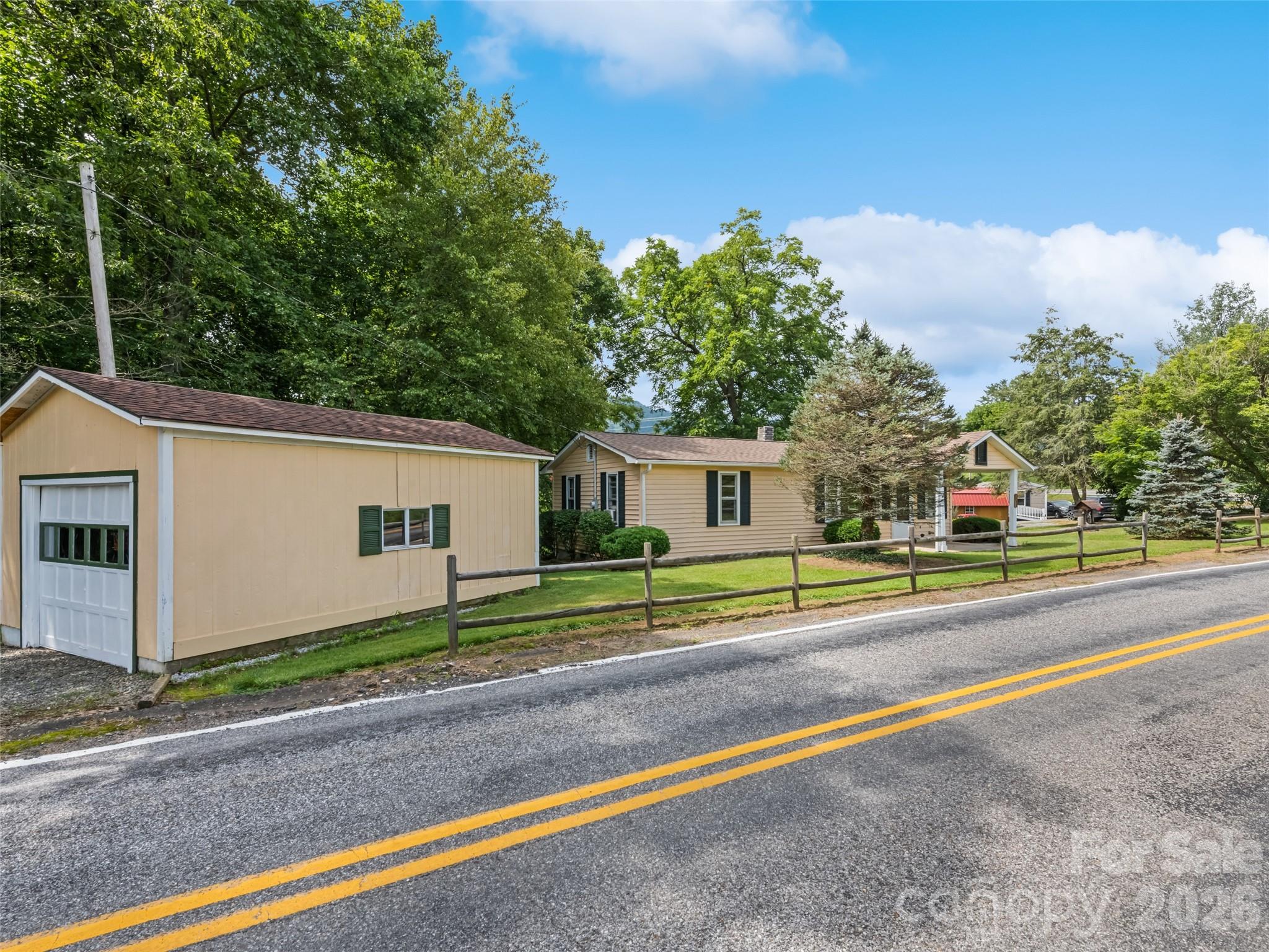 1714 Iron Duff Road Waynesville, NC 28785 - Photo 3 of 25 a house view with a backyard space