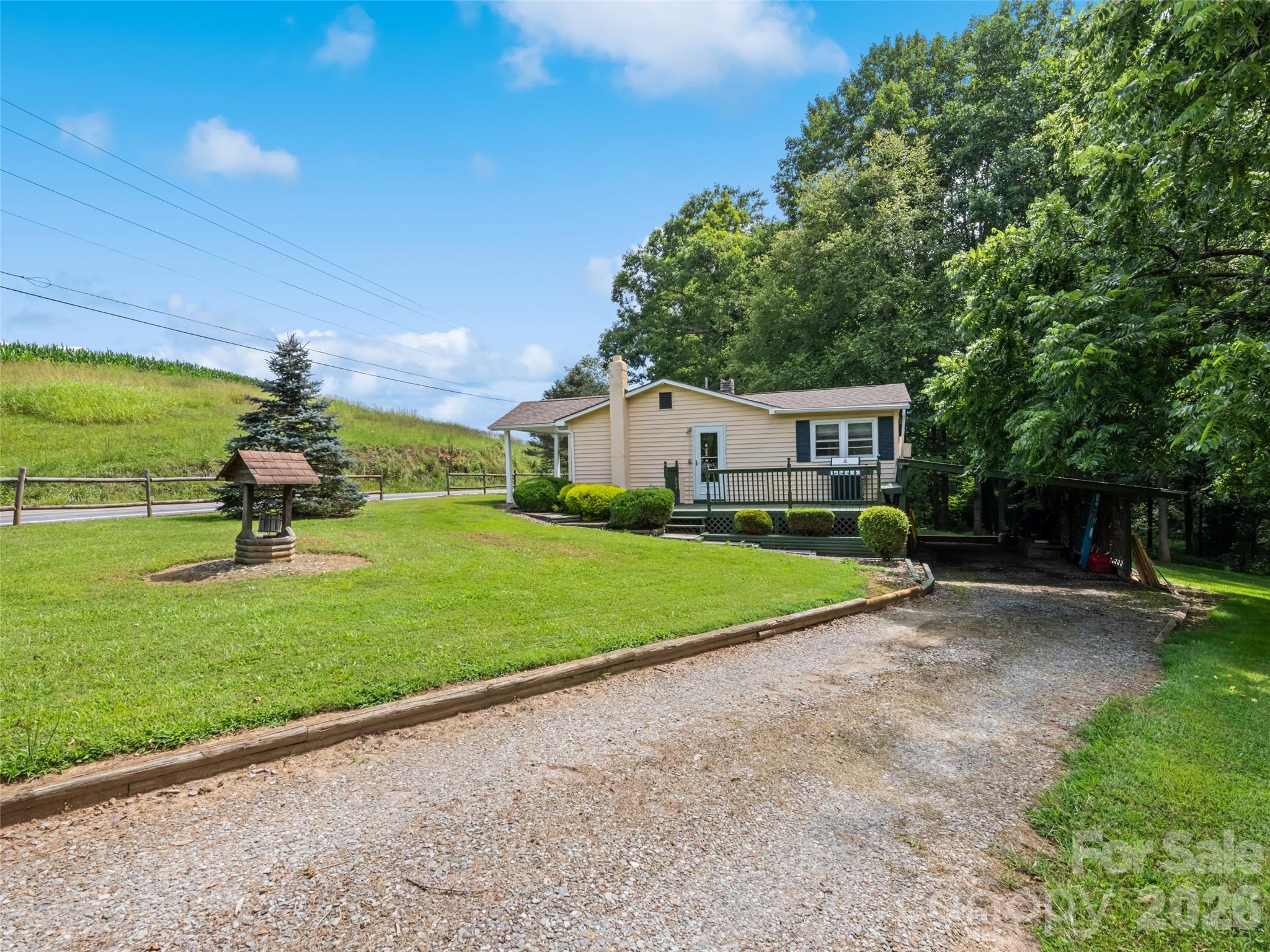 1714 Iron Duff Road Waynesville, NC 28785 - Photo 6 of 25 a house view with a garden space