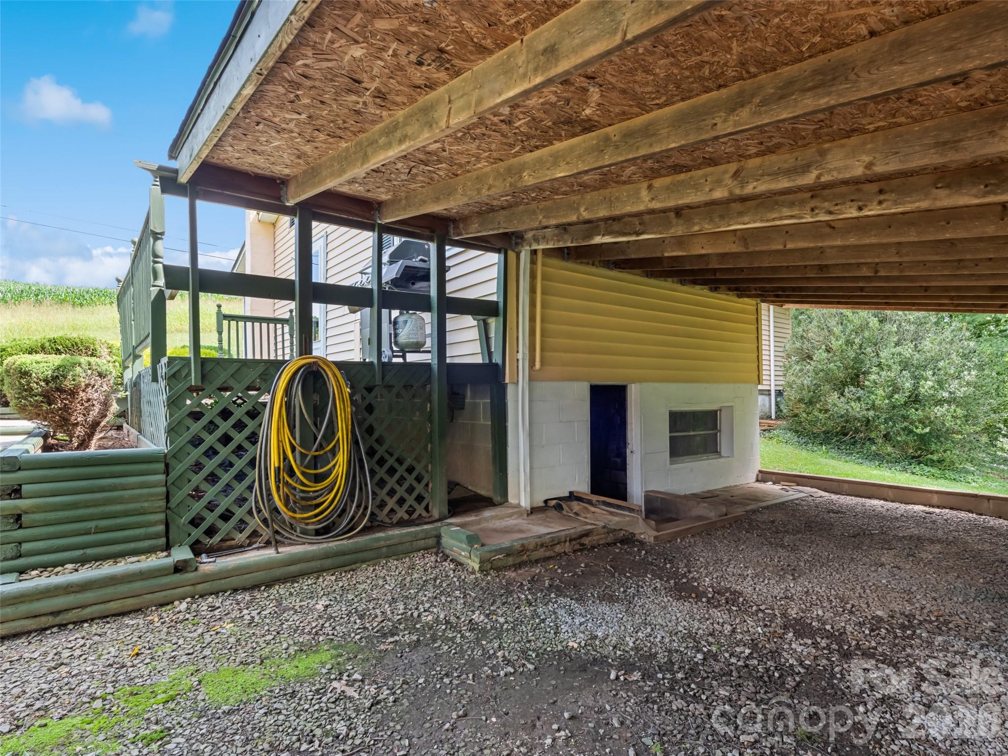 1714 Iron Duff Road Waynesville, NC 28785 - Photo 8 of 25 a front view of a house with garden