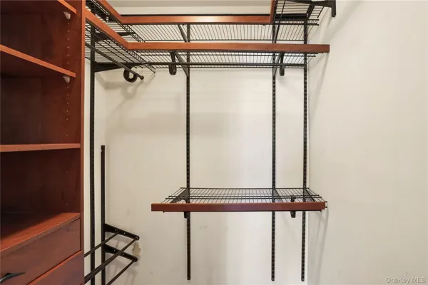 a view of a room with rack on the wall